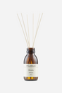 Brun flaske med Munkholm Woody diffuser, 100 ml, med duftpinde i toppen.