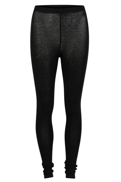 Sorte leggings med elastisk talje og tætsiddende pasform. Opsamlet ved anklerne.