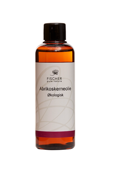 Flasken er ravfarvet med sort låg, mærket "Fischer Pure Nature Abrikoskerneolie Økologisk", 100 ml.