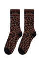 Strømper med mørkebrunt leopardmønster, sort hæl og tå, kontrastkant med "lala"-tekst.